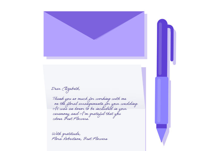 thank you letter on a table with an envelope and a pen